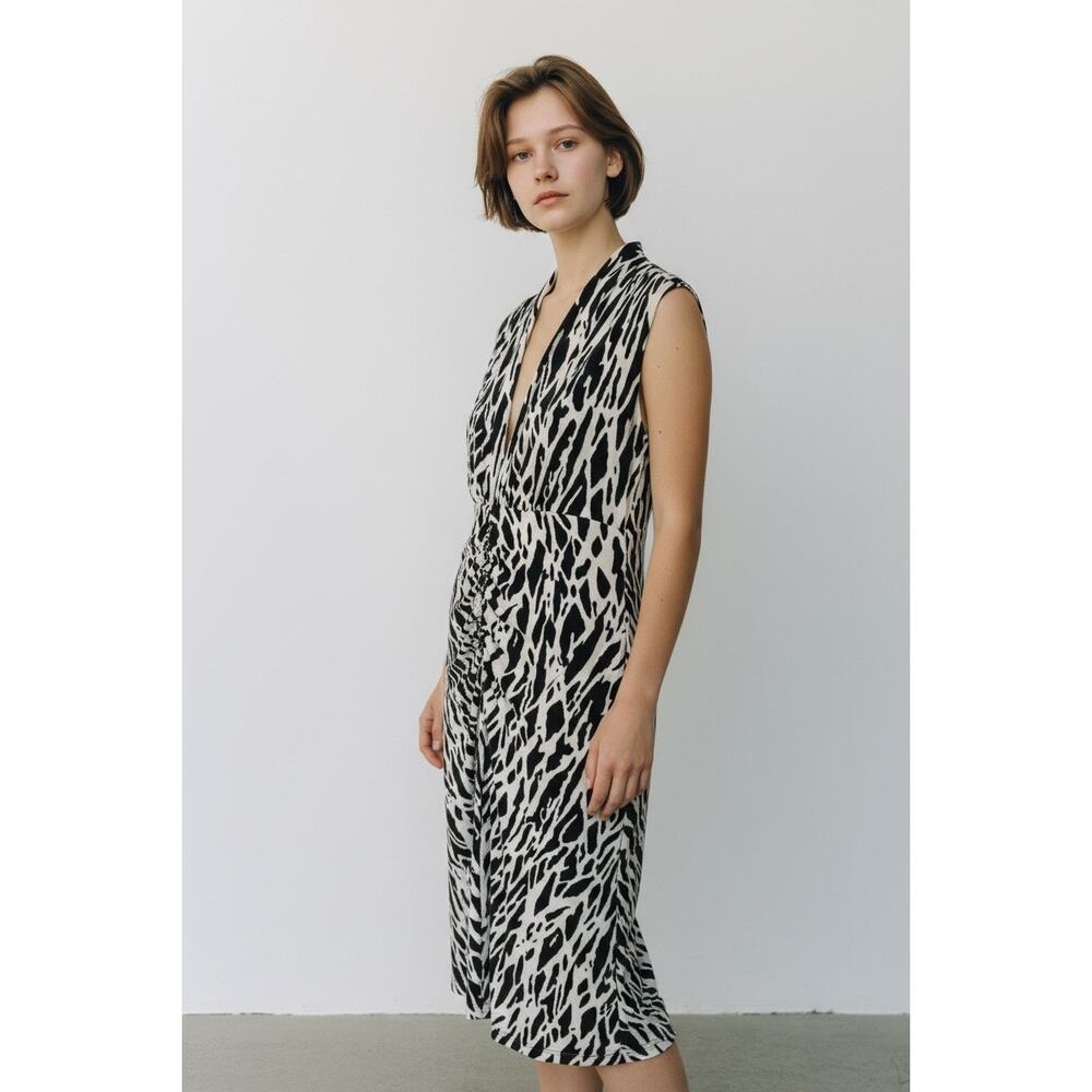 Arden B. Black/tan animal print below the knee dress Size medium